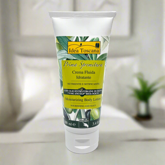 Tube of Idea Toscana moisturizing body lotion on a white background