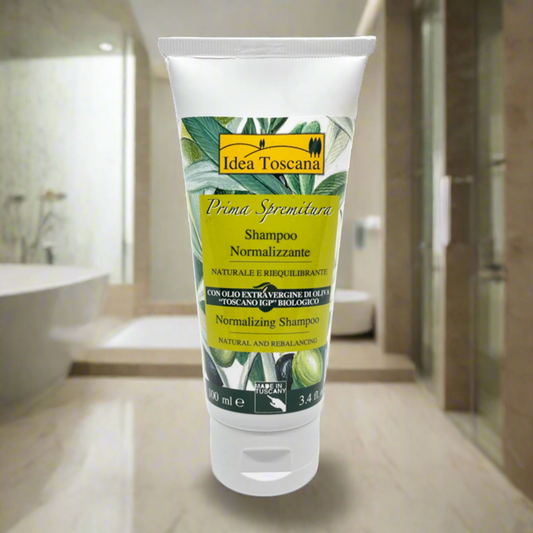 Tube of Idea Toscana shampoo with green label on a white background