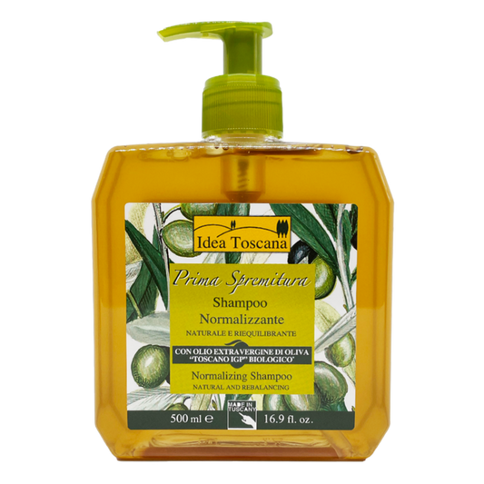 Shampoo bottle with olive oil design and 'Idea Toscana' branding on a white background
